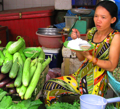 Produce Vendor At Saigon Market
